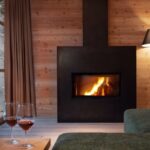 Adler Lodge Ritten Kaminfeuer im Winter